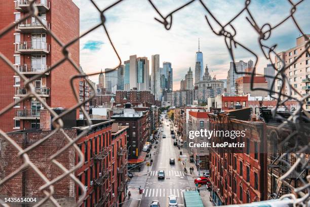 lower manhattan skyline and chinatown. - wall street lower manhattan stock pictures, royalty-free photos & images