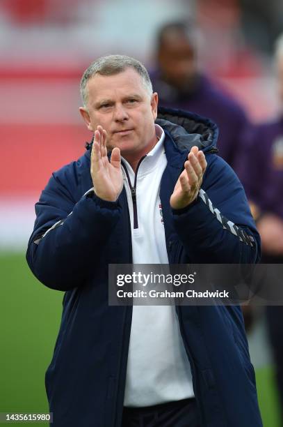 Mark Robins Coventry City manager acknowledges the fans after the Sky Bet Championship game between Stoke City and Coventry City at Bet365 Stadium on...