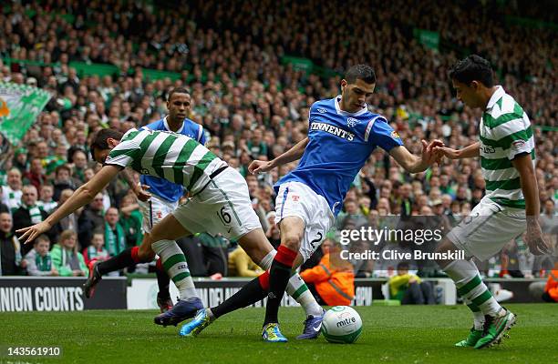 Salim Kerkar of Rangers moves away from Joe Ledley of Celtic during the Clydesdale Bank Premier League match between Celtic and Rangers at Celtic...