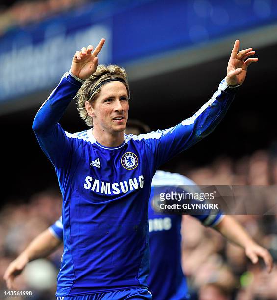 Chelsea's Spanish striker Fernando Torres celebrates scoring the fifth goal during their English Premier League football against Queens Park Rangers...