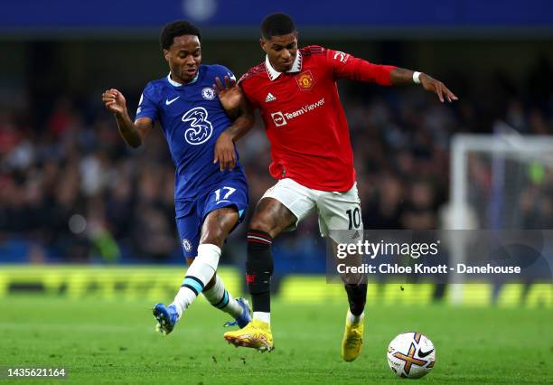 Raheem Sterling of Chelsea FC and Marcus Rashford of Manchester United battle for the ball during the Premier League match between Chelsea FC and...