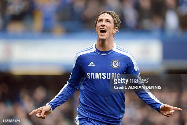 Chelsea's Spanish forward Fernando Torres runs to celebrate after scoring Chelsea's fourth goal against Queens Park Rangers during the English...