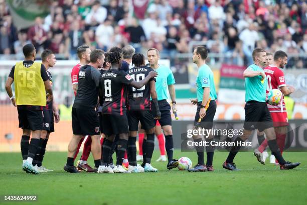 Leipzig head coach Marco Rose of Leipzig and Players reacts after the game during the Bundesliga match between FC Augsburg and RB Leipzig at...