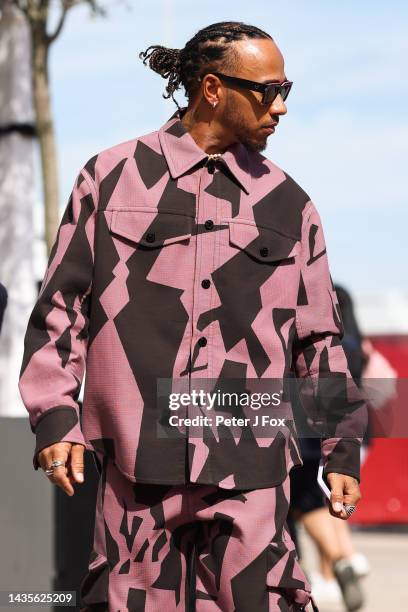 Lewis Hamilton of Mercedes and Great Britain arrives into the paddock during qualifying ahead of the F1 Grand Prix of USA at Circuit of The Americas...