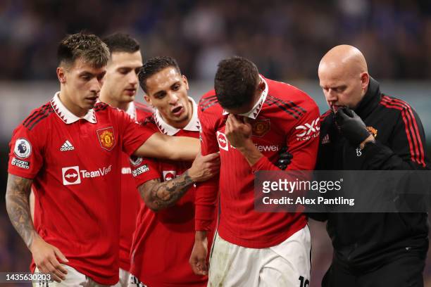 Raphael Varane of Manchester United shows emotion as he leaves the pitch with an injury during the Premier League match between Chelsea FC and...
