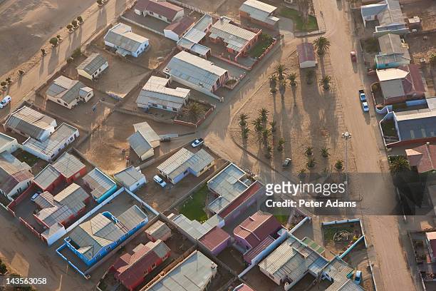 aerial view of houses, walvis bay, namibia - walvis bay foto e immagini stock