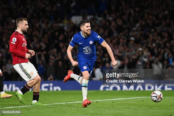 Jorginho of Chelsea celebrates after scoring their team's first goal during the Premier League match between Chelsea FC and Manchester United at...
