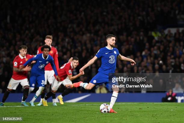 Jorginho of Chelsea scores their team's first goal from the penalty spot during the Premier League match between Chelsea FC and Manchester United at...