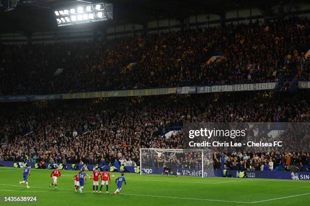 Jorginho of Chelsea scores their team's first goal from the penalty spot during the Premier League match between Chelsea FC and Manchester United at...