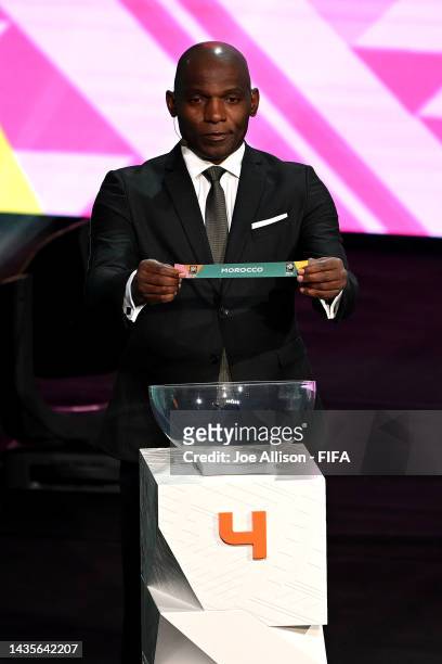 Draw Assistant Geremi Njitap draws out Morocco during the FIFA Women's World Cup 2023 Final Tournament Draw at Aotea Centre on October 22, 2022 in...