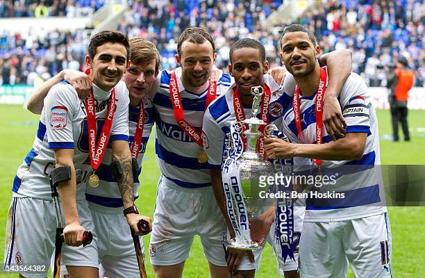 Reading players Jem Karacan, Jay Tabb, Noel Hunt, Shaun Cummings and Jobi McAnuff celebrate with the npower Championship Trophy during the Reading...