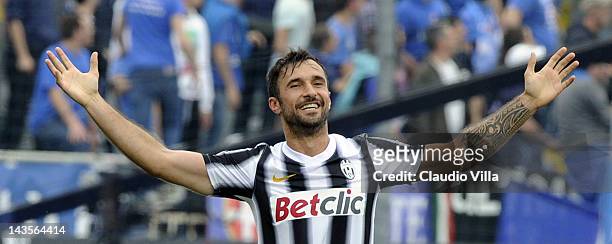 Mirko Vucinic of Juventus FC celebrates scoring the first goal during the Serie A match between Novara Calcio and Juventus FC at Silvio Piola Stadium...