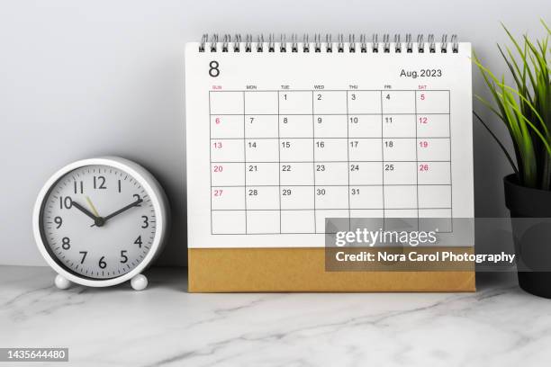 august 2023 desk calendar on top of desk - monthly event stock pictures, royalty-free photos & images