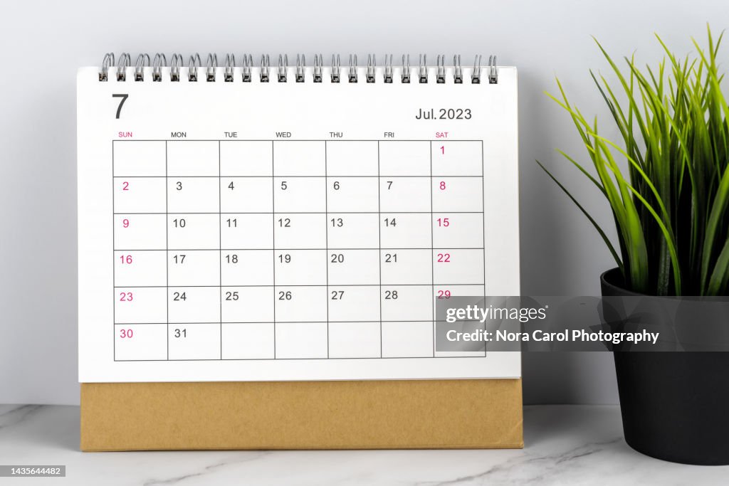 July 2023 Desk Calendar on Top of Desk