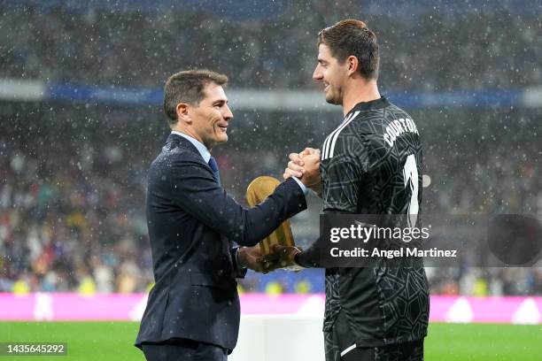 Thibaut Courtois of Real Madrid is presented with the Yashin Trophy prior to the LaLiga Santander match between Real Madrid CF and Sevilla FC at...