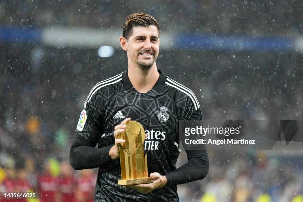 Thibaut Courtois of Real Madrid is presented with the Yashin Trophy prior to the LaLiga Santander match between Real Madrid CF and Sevilla FC at...