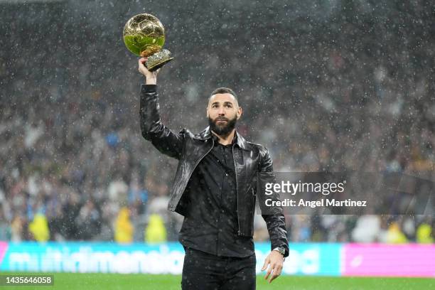 Karim Benzema of Real Madrid is presented with the Ballon d'Or trophy prior to the LaLiga Santander match between Real Madrid CF and Sevilla FC at...