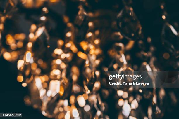 defocused christmas crystal lights - crystal chandelier stock pictures, royalty-free photos & images
