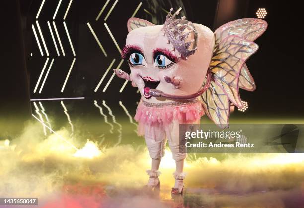 Zahnfee" performs onstage during the 4th show of "The Masked Singer" on October 22, 2022 in Cologne, Germany.