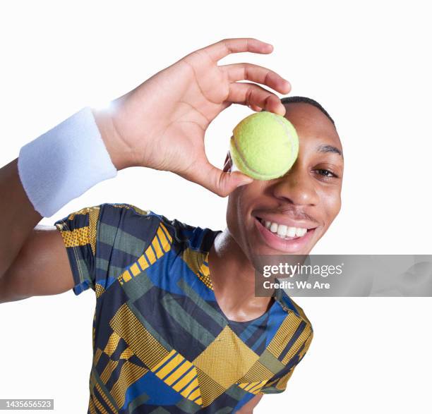 tennis player with tennis ball - tennis ball white background stock pictures, royalty-free photos & images