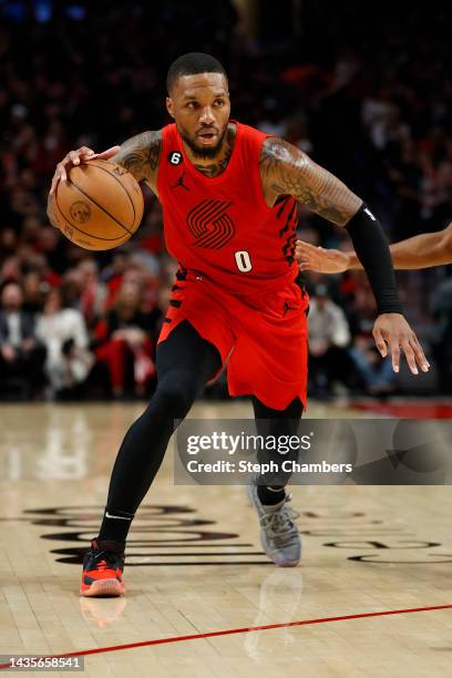 Damian Lillard of the Portland Trail Blazers dribbles against the Phoenix Suns during the third quarter at Moda Center on October 21, 2022 in...