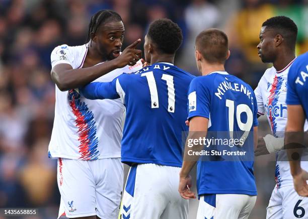 Everton player Demarai Gray has words with Palace striker Jean-Philippe Mateta during the Premier League match between Everton FC and Crystal Palace...