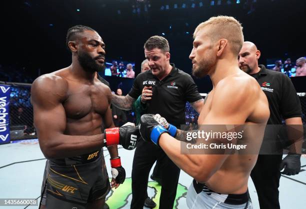 Opponents Aljamain Sterling and TJ Dillashaw face off prior to their UFC bantamweight championship fight during the UFC 280 event at Etihad Arena on...