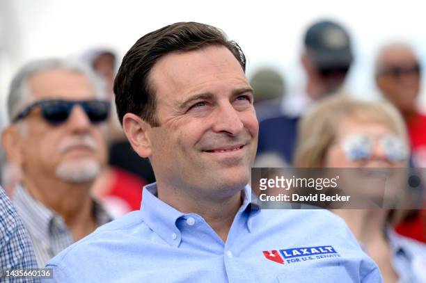 Nevada Republican U.S. Senate nominee Adam Laxalt listens to speakers during a campaign rally on October 22, 2022 in Las Vegas, Nevada. Laxalt is in...