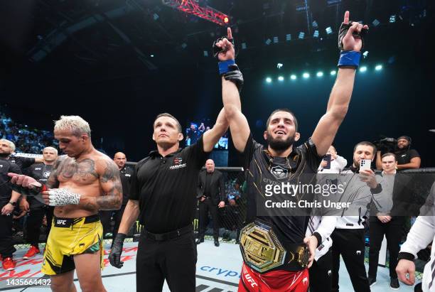 Islam Makhachev of Russia celebrates after his victory over Charles Oliveira of Brazil in their UFC lightweight championship fight during the UFC 280...