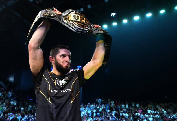 Islam Makhachev of Russia celebrates after his victory over Charles Oliveira of Brazil in their UFC lightweight championship fight during the UFC 280...
