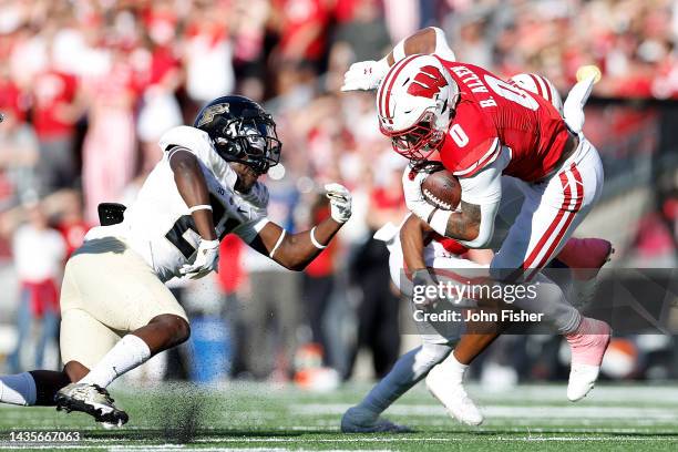 Braelon Allen of the Wisconsin Badgers rushes the ball in the second quarter against the Purdue Boilermakers at Camp Randall Stadium on October 22,...