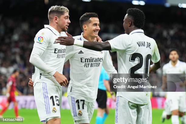 Lucas Vazquez celebrates with Federico Valverde and Vinicius Junior of Real Madrid after scoring their team's second goal during the LaLiga Santander...