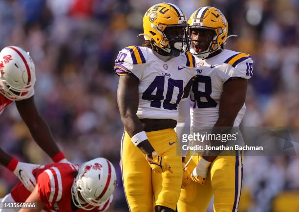 Harold Perkins Jr. #40 of the LSU Tigers celebrates a sack during the first half against the Mississippi Rebels at Tiger Stadium on October 22, 2022...
