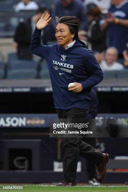 Former New York Yankees outfielder Hideki Matsui waves prior to his ceremonial first pitch prior to game three of the American League Championship...