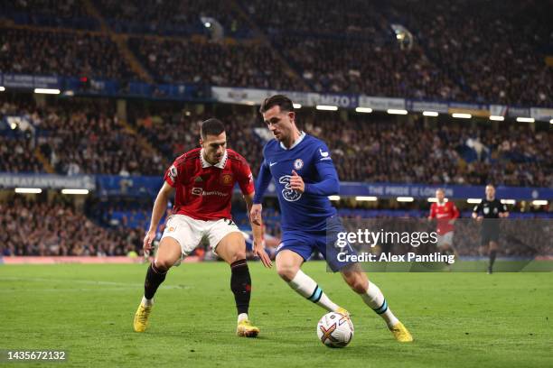 Ben Chilwell of Chelsea holds off Diego Dalot of Manchester United during the Premier League match between Chelsea FC and Manchester United at...