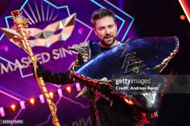 Felix von Jascheroff unmasked aka "Die Black Mamba" poses for photographers onstage after the 4th show of "The Masked Singer" on October 22, 2022 in...