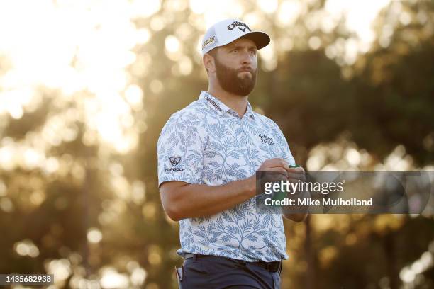Jon Rahm of Spain opens a snack after hitting a tee shot on the 17th hole during the third round of the CJ Cup at Congaree Golf Club on October 22,...