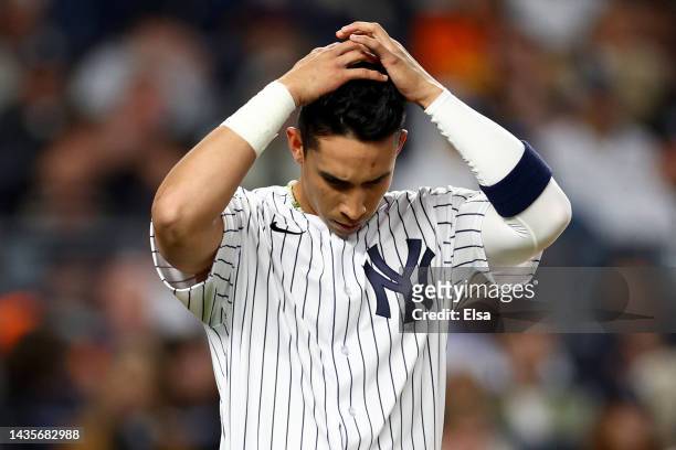 Oswaldo Cabrera of the New York Yankees reacts after striking out against the Houston Astros to end the fifth inning in game three of the American...