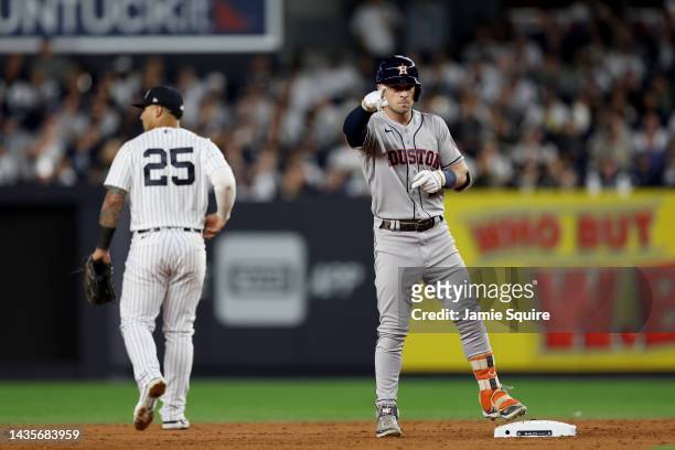Alex Bregman of the Houston Astros reacts after his double against the New York Yankees during the sixth inning in game three of the American League...