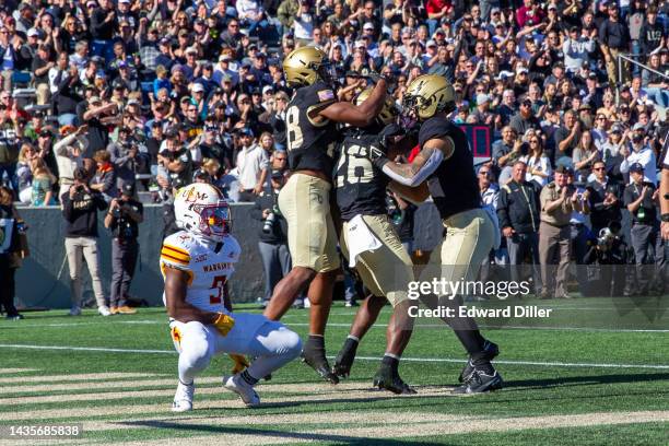 Army Black Knights players celebrate a dropped touchdown pass during the game against the Louisiana Monroe Warhawks at Michie Stadium on October 22,...