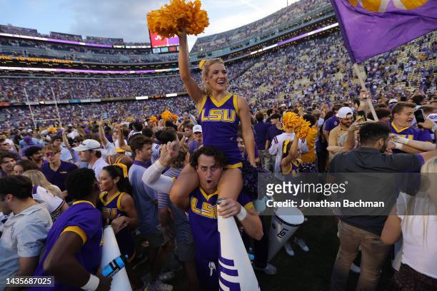 Fans celebrate on the field after the LSU Tigers' win over the Mississippi Rebels at Tiger Stadium on October 22, 2022 in Baton Rouge, Louisiana.