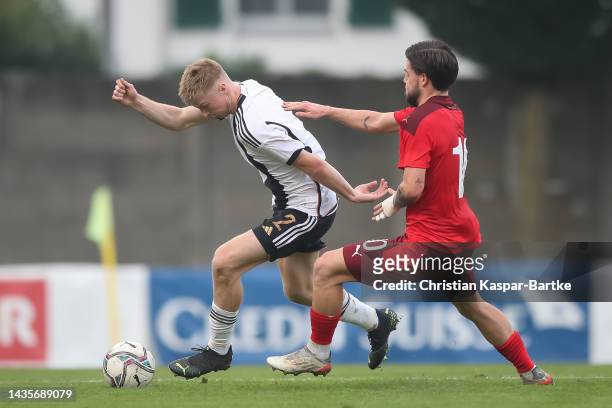 Julian Eitschberger of Germany U19 challenges Liam Chipperfield of Switzerland U19 during the International Friendly match between Switzerland U19...