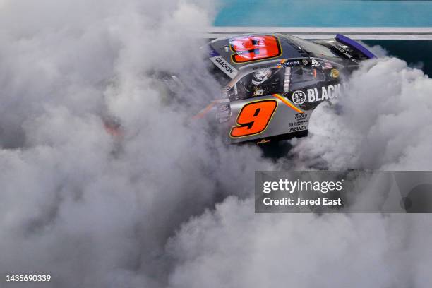 Noah Gragson, driver of the Bass Pro Shops/TrueTimber/BRCC Chevrolet, celebrates with a burnout after winning the NASCAR Xfinity Series Contender...