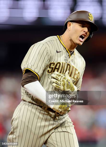 Manny Machado of the San Diego Padres celebrates his solo home run during the first inning against the Philadelphia Phillies in game four of the...