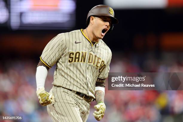 Manny Machado of the San Diego Padres celebrates his solo home run during the first inning against the Philadelphia Phillies in game four of the...