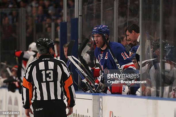 Brad Richards of the New York Rangers talks to referee Dan O'Halloran in Game Seven of the Eastern Conference Quarterfinals against the Ottawa...
