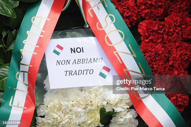 Detail of the writing "we have not betrayed" at commemoration ceremony for the death of Italian dictator Benito Mussolini and his mistress, Claretta...