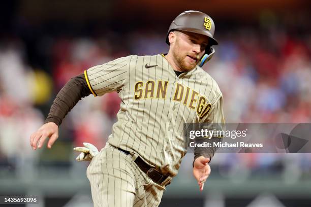 Brandon Drury of the San Diego Padres scores a run during the first inning against the Philadelphia Phillies in game four of the National League...