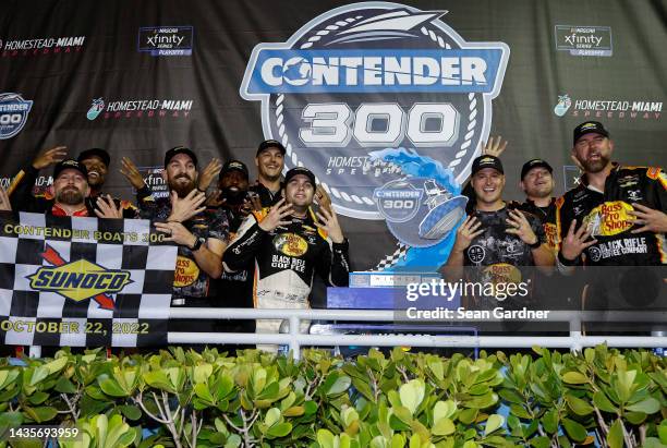 Noah Gragson, driver of the Bass Pro Shops/TrueTimber/BRCC Chevrolet, and crew celebrate in victory lane after winning the NASCAR Xfinity Series...