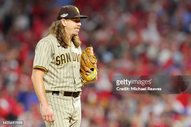 Mike Clevinger of the San Diego Padres leaves the game during the first inning against the Philadelphia Phillies in game four of the National League...